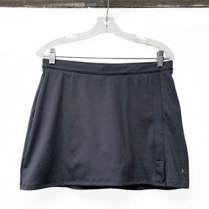 Danskin athletic tennis skirt with built in shorts and pocket for a ball